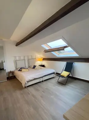 Un ou plusieurs lits dans un hébergement de l'établissement Joli studio centre-ville Vendôme