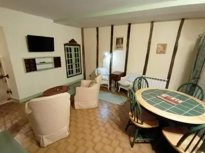 Télévision ou salle de divertissement dans l'établissement Les écuries des Princesses
