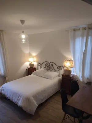 Un ou plusieurs lits dans un hébergement de l'établissement la tour carrée d'un chateau