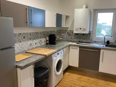 Cuisine ou kitchenette dans l'établissement Le Loge'Mans