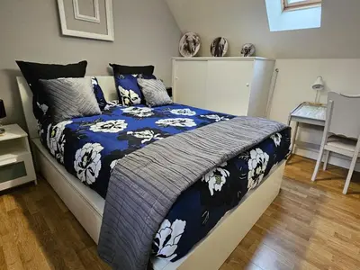 Un ou plusieurs lits dans un hébergement de l'établissement Le Petit Nice Maison semi-troglodyte de charme.