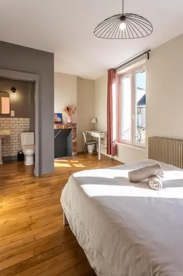 Un ou plusieurs lits dans un hébergement de l'établissement L'Orée du Faubourg - VENDOME CENTRE