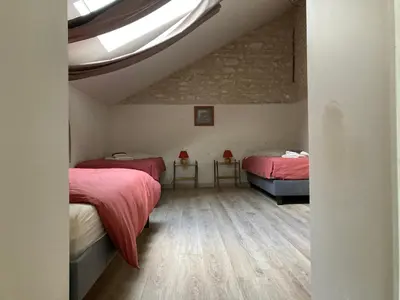 Un ou plusieurs lits dans un hébergement de l'établissement Charmant Gîte au calme, coeur Touraine, proche Chenonceaux