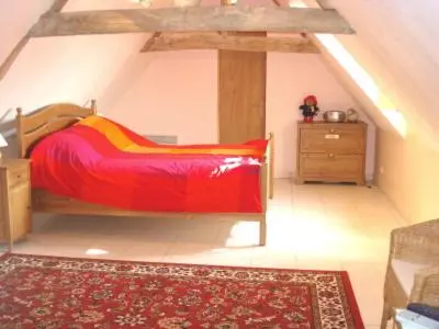 Un ou plusieurs lits dans un hébergement de l'établissement La Maison Tournesol - 3 bedroom house with large garden near Saumur