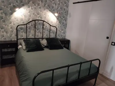 Un ou plusieurs lits dans un hébergement de l'établissement Très beau studio quartier Cathédrale bord de Loire