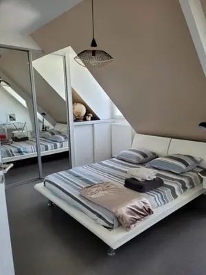 Un ou plusieurs lits dans un hébergement de l'établissement Chambre chez particulier 10mn du circuit