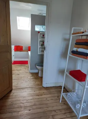 Un ou plusieurs lits dans un hébergement de l'établissement Chambres d'hôtes de charme sur LE MANS