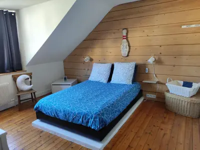 Un ou plusieurs lits dans un hébergement de l'établissement Chambres d'hôtes de charme sur LE MANS