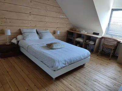 Un ou plusieurs lits dans un hébergement de l'établissement Chambres d'hôtes de charme sur LE MANS