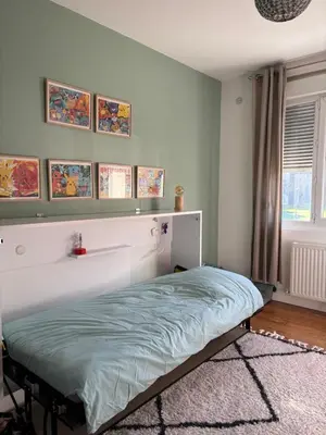 Un ou plusieurs lits dans un hébergement de l'établissement Maison à 2km du circuit des 24h