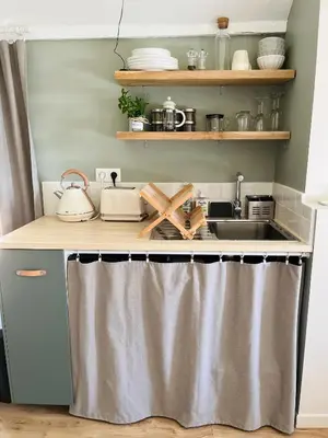 Cuisine ou kitchenette dans l'établissement Studio du Grand Beaumont