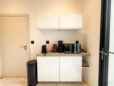 Cuisine ou kitchenette dans l'établissement Les Trois Cyprès