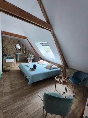 Un ou plusieurs lits dans un hébergement de l'établissement Sophie LE FEUVRE - Soins Energétiques
