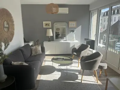 Coin salon dans l'établissement Appartement LE JULES FAVRE