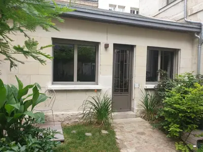 Jardin de l'établissement Maisonnette cosy cœur centre avec accueil vélo