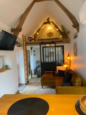 Coin salon dans l'établissement Tiny housse la Poitevinière