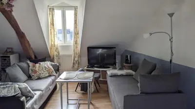 Coin salon dans l'établissement Chambres d'hôtes La Charmante