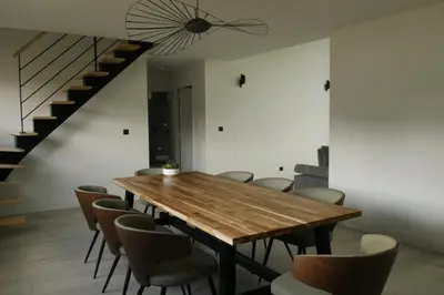 Coin salon dans l'établissement Logement à 100m du virage d'Arnage- Circuit des 24h du Mans - 6 personnes