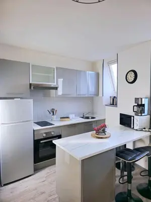 Cuisine ou kitchenette dans l'établissement Le nid de la mésange Parking Gratuit
