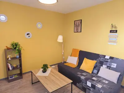 Coin salon dans l'établissement Le nid de la mésange Parking Gratuit