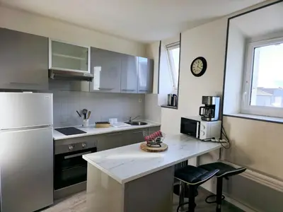 Cuisine ou kitchenette dans l'établissement Le nid de la mésange Parking Gratuit