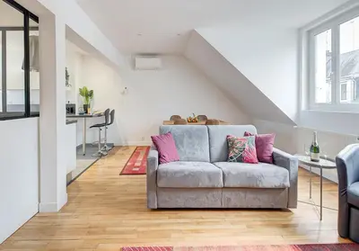 Coin salon dans l'établissement Appartement Confort, Hyper Centre à Tours, Climatisation