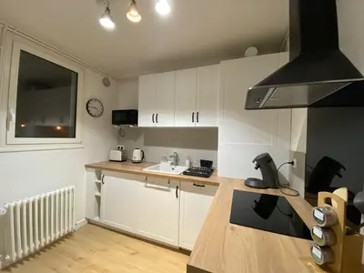Cuisine ou kitchenette dans l'établissement Appartement cosy près de la gare avec parking