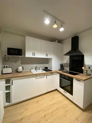 Cuisine ou kitchenette dans l'établissement Appartement cosy près de la gare avec parking