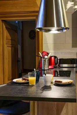 Cuisine ou kitchenette dans l'établissement La cour du grand marché
