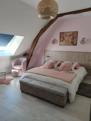 Un ou plusieurs lits dans un hébergement de l'établissement Chambre d'hôtes