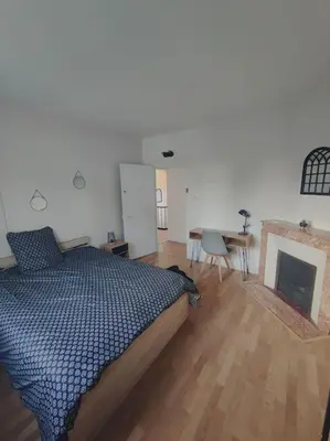 Un ou plusieurs lits dans un hébergement de l'établissement Maison 8 couchages