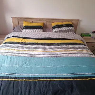 Un ou plusieurs lits dans un hébergement de l'établissement Maison pour location de chambre circuit 24H et GP