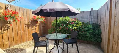 Jardin de l'établissement Havre de Paix - Maisonnette Charmante avec Extérieur Privé