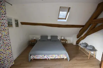 Un ou plusieurs lits dans un hébergement de l'établissement Chambres d'Hôtes L'Hermine Vineuil