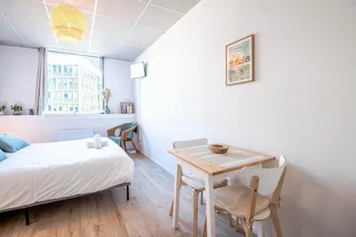 Un ou plusieurs lits dans un hébergement de l'établissement Appartement Le Cocooning
