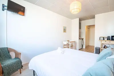 Un ou plusieurs lits dans un hébergement de l'établissement Appartement Le Cocooning