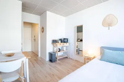 Un ou plusieurs lits dans un hébergement de l'établissement Appartement Le Cocooning