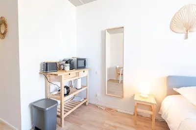 Un ou plusieurs lits dans un hébergement de l'établissement Appartement Le Cocooning