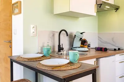 Cuisine ou kitchenette dans l'établissement La petite Chambord aux portes du château