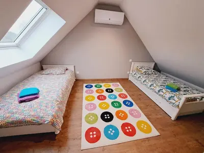 Un ou plusieurs lits dans un hébergement de l'établissement Le Bonheur est dans le Pré.