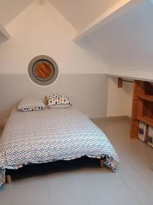 Un ou plusieurs lits dans un hébergement de l'établissement Maison a la campagne