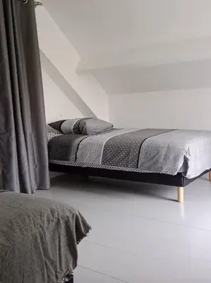 Un ou plusieurs lits dans un hébergement de l'établissement Maison a la campagne