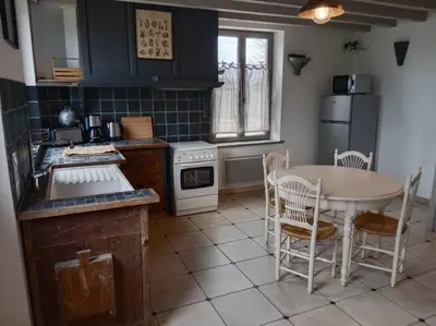 Cuisine ou kitchenette dans l'établissement Maison a la campagne