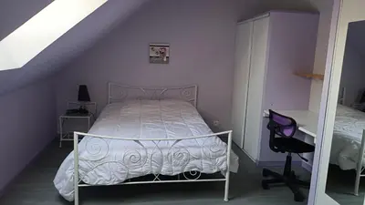 Un ou plusieurs lits dans un hébergement de l'établissement serge et annick