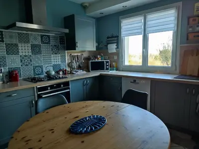 Cuisine ou kitchenette dans l'établissement chambre chez l'habitant aux Basses Besnardières
