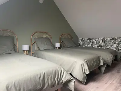 Un ou plusieurs lits dans un hébergement de l'établissement Gîte La Patouille