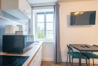 Cuisine ou kitchenette dans l'établissement Bistrot 8
