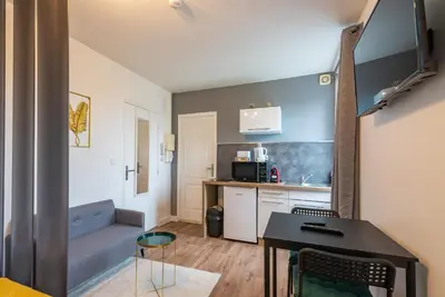 Cuisine ou kitchenette dans l'établissement Bistrot 8