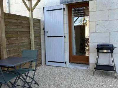 Terrasse ou espace extérieur de l'établissement Gîte de charme à La Loire : Balnéo, Jardin, Parking - FR-1-381-526