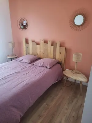 Un ou plusieurs lits dans un hébergement de l'établissement Chambre B&B - proche circuit 24 heures du Mans